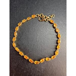Yellow spessartine garnet tennis bracelet in gold over sterling silver